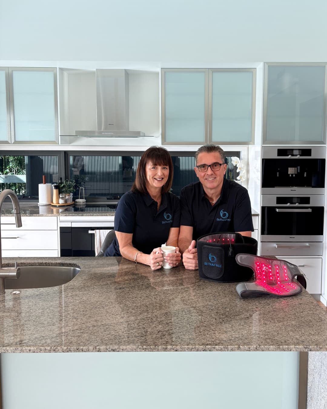 Deborah and Jonathan Bispham at home with the Be Pain Free Back and Body Wrap and Shoulder and Knee Brace